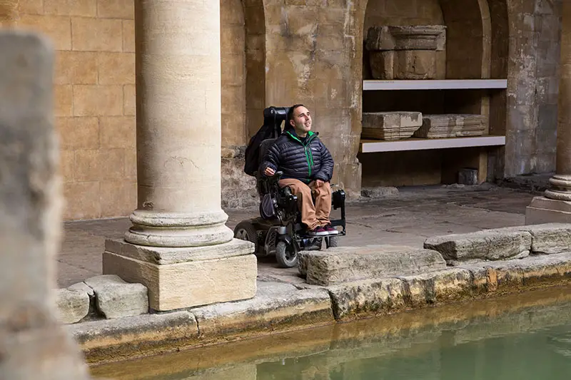 Martin trys out the accessibility of the Roman Baths museum. March 2015. Photographer Freia Turland e:info@ftphotography.co.uk m:07875514528