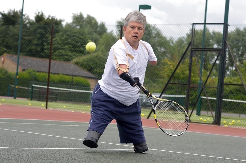 John Willis playing Paralympic tennis