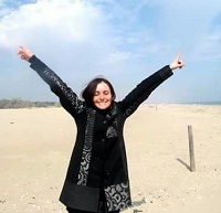 Gloria, who has an invisiabe disability, on beach