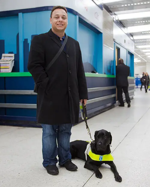 Daniel with this guide dog