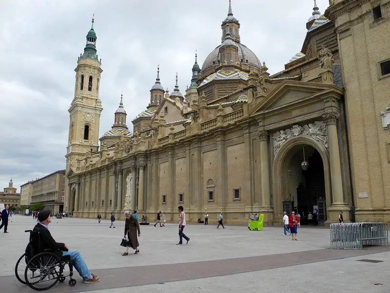 Wolf in his wheelchair outside Basilica del Pilar in Zaragoza