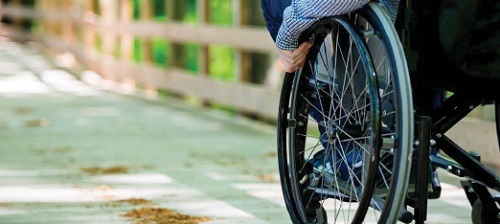 Wheelchair wheel on a bridge