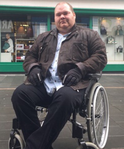 Simon Sansome in his wheelchair