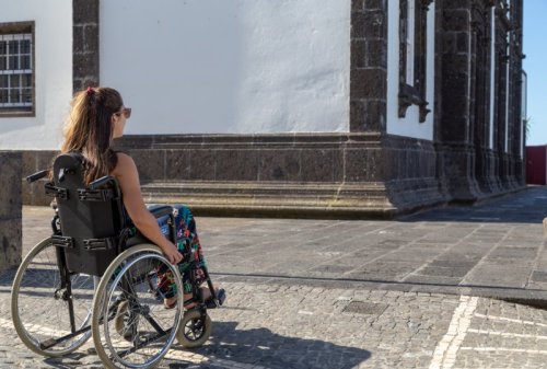 Female wheelchair user in Azores town