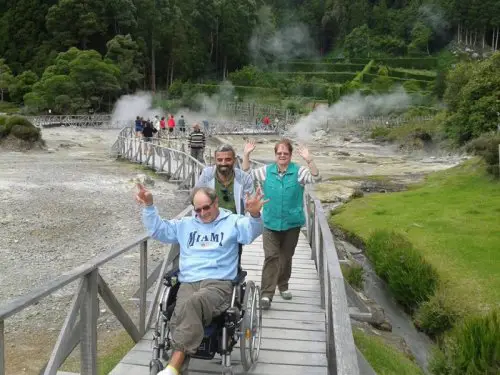 Wheelchair user coming over bridge in Azores