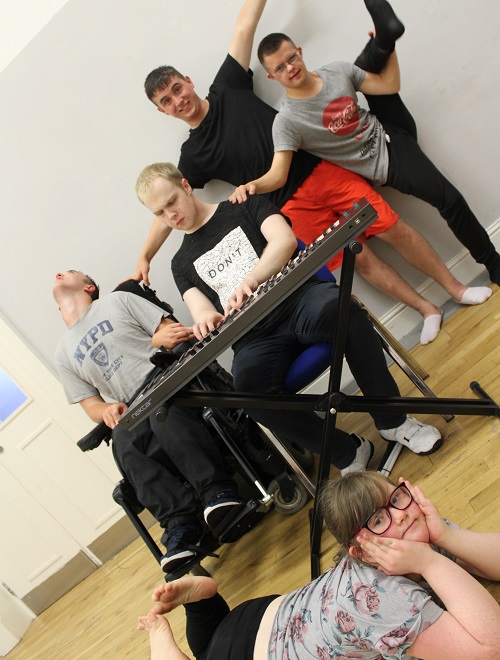 A group of disabled people making music