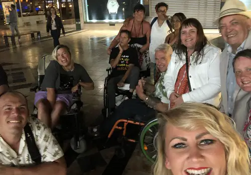 A group of disabled travellers on a disabled-friendly holiday with Limitless Travel