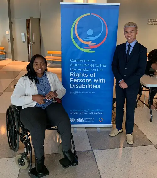 Regina and Markus attending COSP as Leonard Cheshire's youth advocates for disabled people
