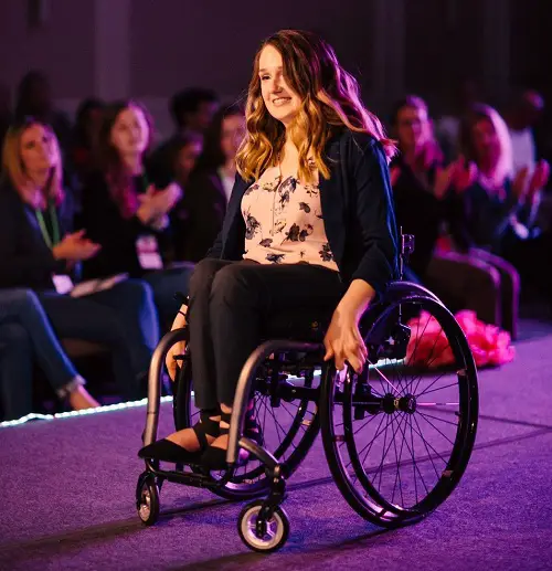 Wheelchair user Shannon modelling in an inclusive fashion show