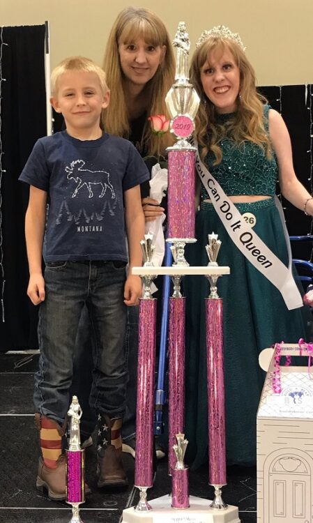 Autumn Kinkade winning a pagent with her family