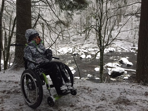 Andrew sat in the MT Push all-terrain trike in snowy Scotland