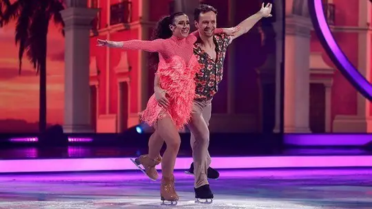 Libby and Mark in salsa outfits
