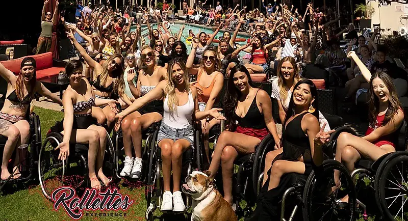 Hundreds of women in wheelchairs at a Rollettes Experience event