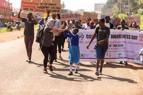 Raabia and students marching for equal access to education