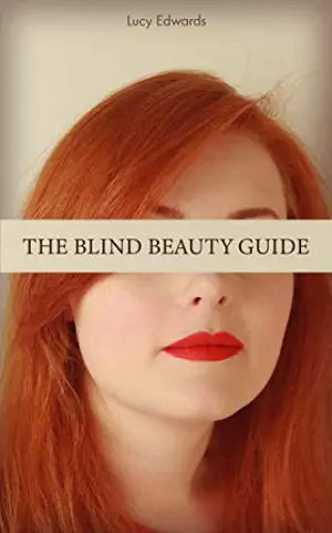 The front cover of Lucy Edwards The Blind Beauty Guide book with the words across her eyes