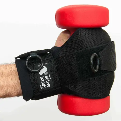 Active Hands gripping aid holding a red weight