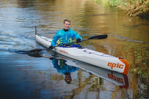 Billy Monger sat in a kayak
