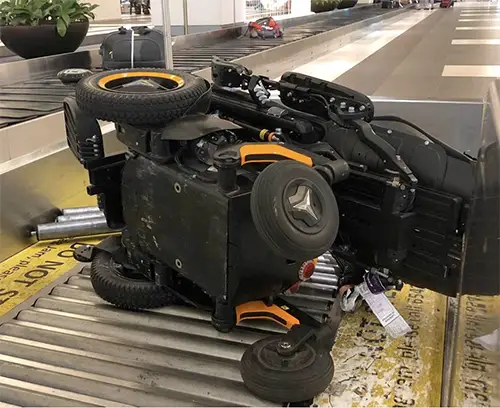 Wheelchair on its side on a conveyer belt copy
