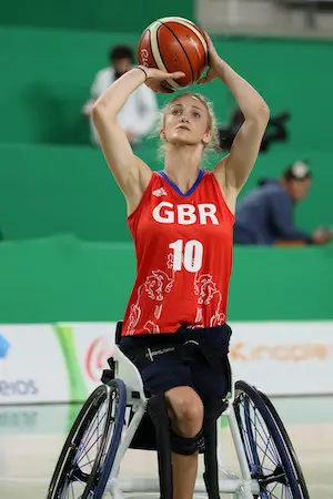 Amy Conroy playing wheelchair basketball