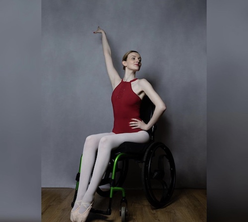 Kate Stanforth doing a ballet pose in her wheelchair