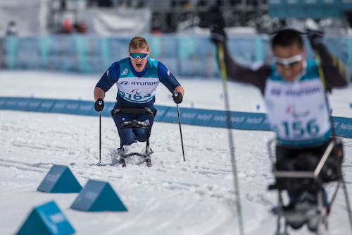 Scott Meenagh competing in Nordic skiing