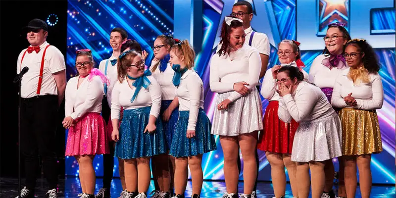 Members of Born to Perform Dance School smiling and laughing on stage at Britain's Got Talent audition