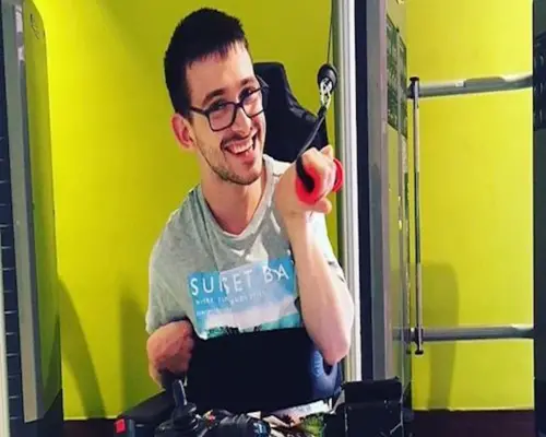 Nath at the gym smiling
